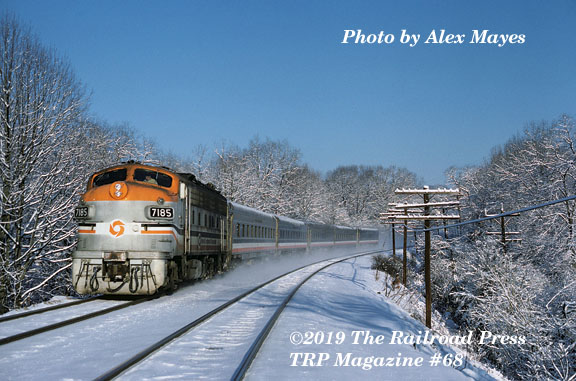 MTA Maryland F Unit with passenger train in snow