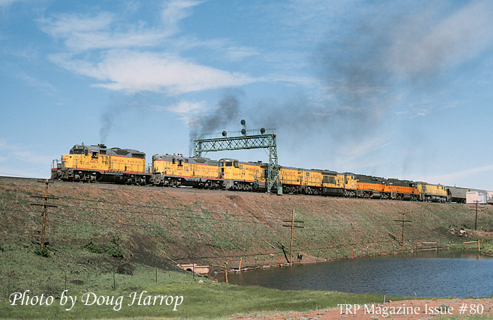 7 Union Pacific and Milwaukee Road Diesels on Train at Hermosa, Wyoming, on Sherman Hill