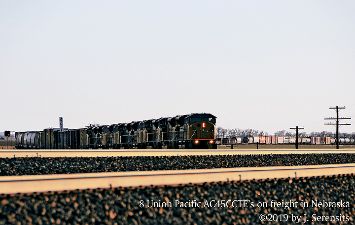 8 Union Pacific AC45CCTE diesels on eastbound freight train at Bushnell, Nebraska