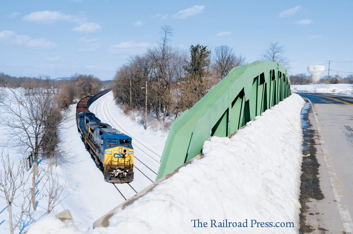 CSX iron ore train rolling through the snow taken from the Grade Road bridge at Martinsburg, West Virginia, on February 14, 2014