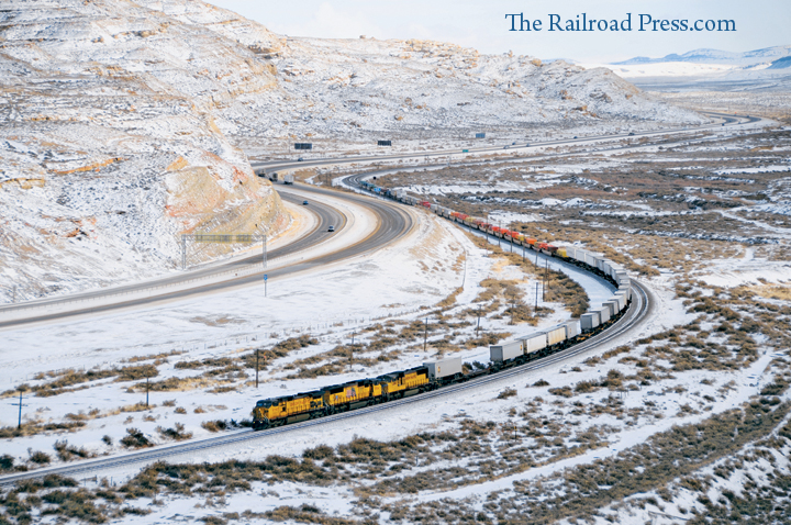 Union Pacific C44-9W and two SD70M's power a westbound intermodal train around the big s-curve at Rock Springs, Wyoming, on December 23, 2008