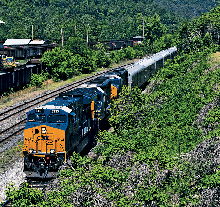 CSX ET44AH #3333 diesel locomotive leading the final Ringling Brothers and Barnum & Bailey circus train on the former New York Central passing the old Union Carbide (WVA Manufacturing) plant at Alloy, West Virginia, on May 8, 2017