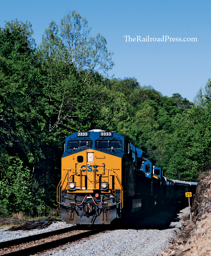 CSX ET44AH #3333 diesel locomotive leading the Ringling Brothers and Barnum & Bailey circus train through a rock cut on the old Virginian Railway at the Brier Creek Road grade crossing in Brenton, West Virginia